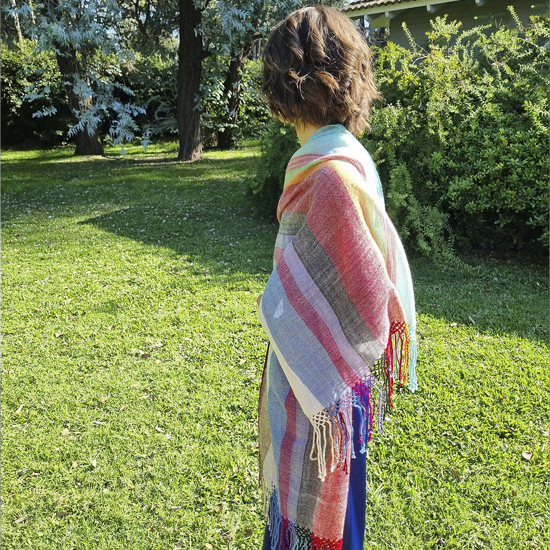 Camino de Colores shawl with soft movement and fringed finish