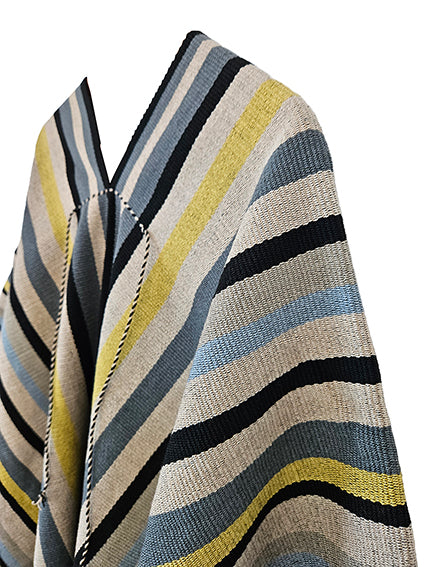 One-cloth Colomé Listado poncho inspired by Argentine gaucho clothing