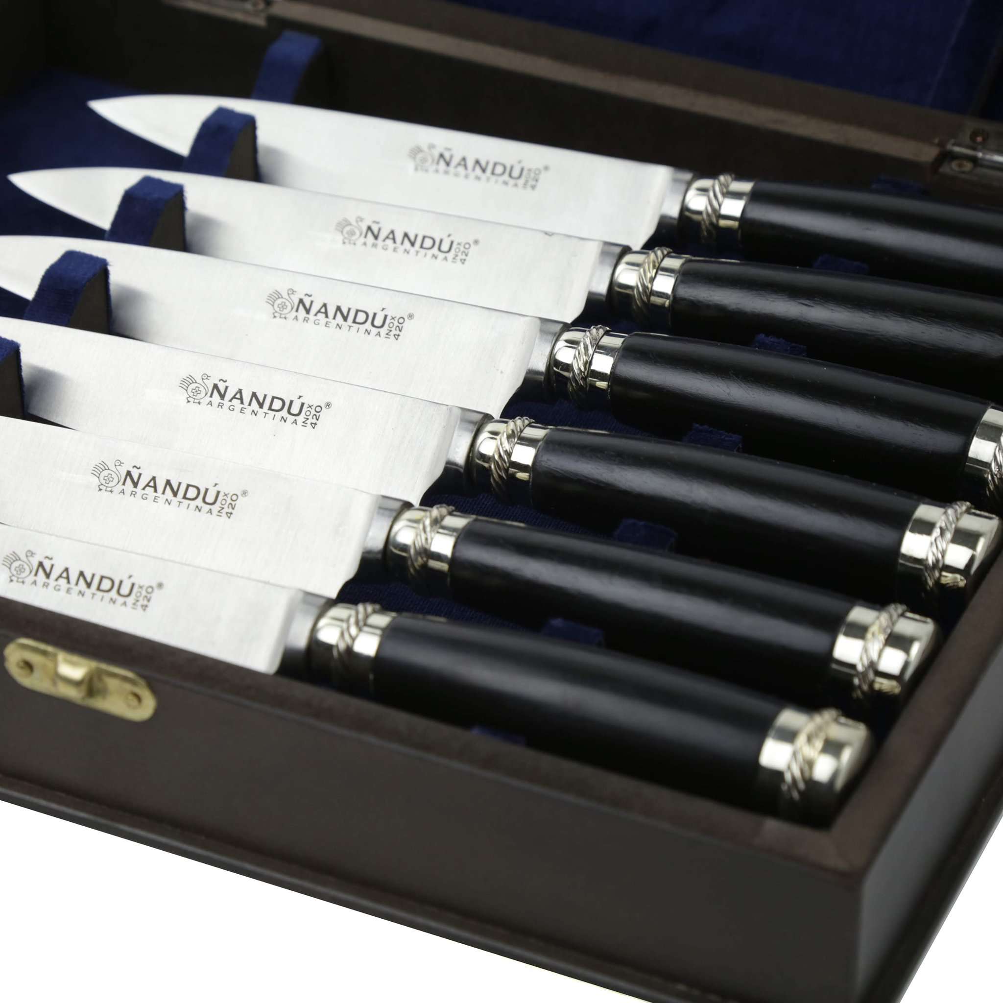 Black Patagonula steak knives set in wooden case